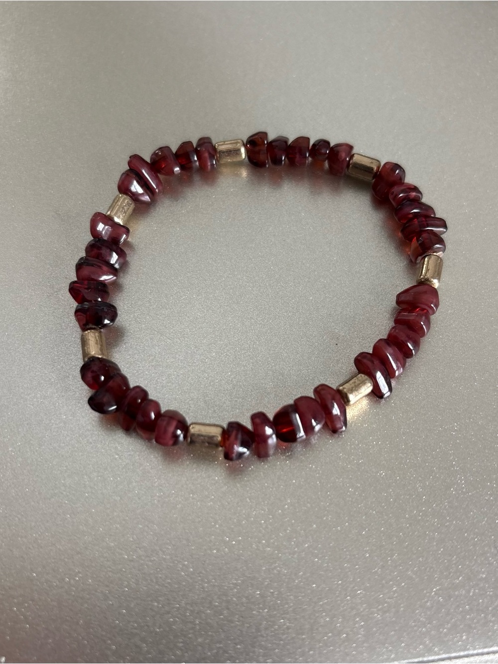Burgundy Beaded Stretch Bracelet with Gold Tone Spacer Beads | Item 0378